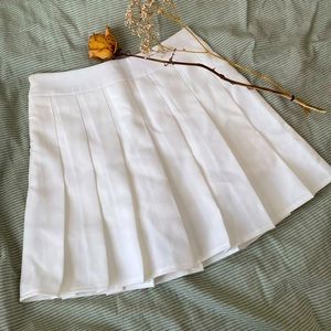 XS white tennis skirt with shorts attached.